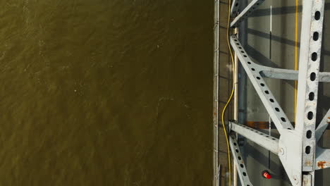 Golden-sunlight-on-Mississippi-River-below-busy-West-Memphis-Delta-Regional-River-Park-bridge