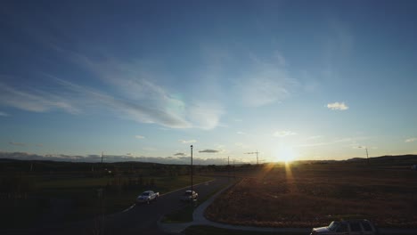 beautiful clouds rolling past the sunset at the edge of the alberta foothill suburbs in the fall; static shot 1080p