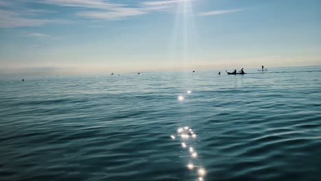 Slow-motion-shot-of-people-enjoying-on-Paddle-board-on-summer-day