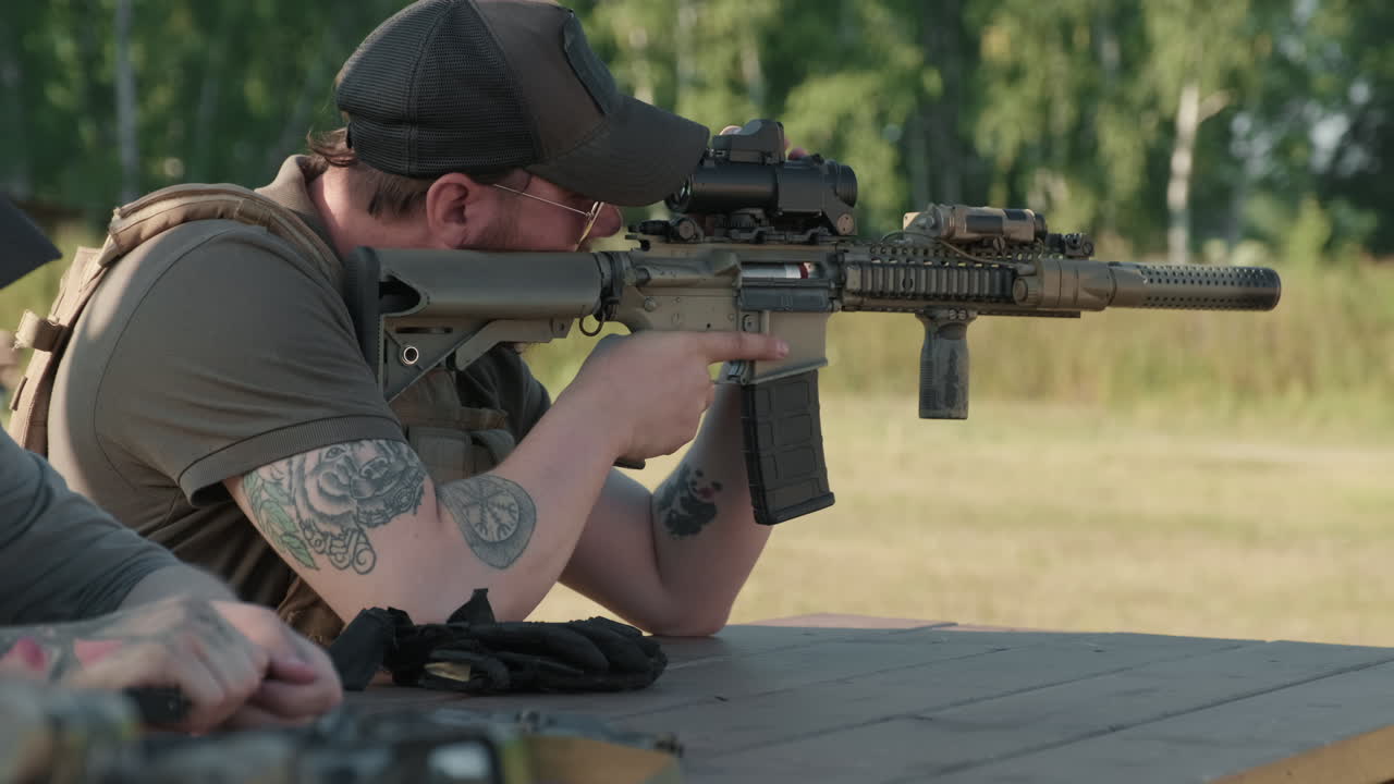 Military Man Taking Aim With Rifle