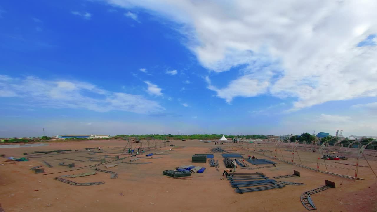 Different parts of metal scaffold on the construction field, industrial doom, worker build a concert stage, stage equipment, timelapse of Hugh contraction