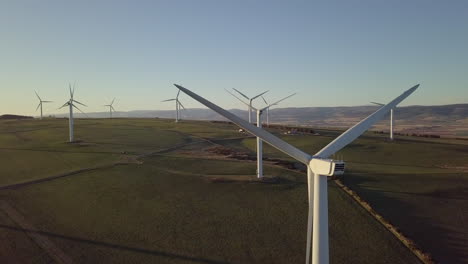 aerial footage of the a wind turbine farm in scotland