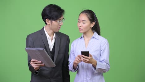 young asian business couple having meeting together