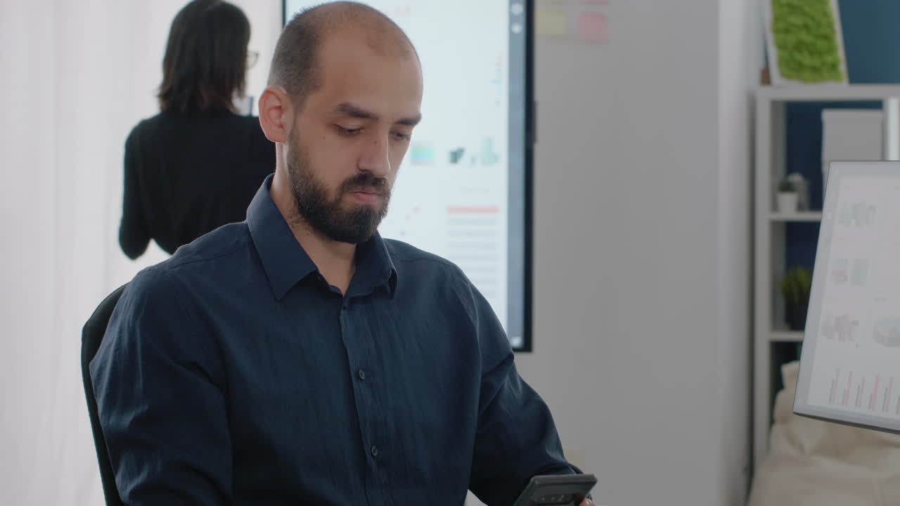 Close up of businessman using smartphone with touch screen