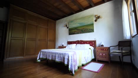 classical wood bedroom with double bed in a vacacional villa in spain