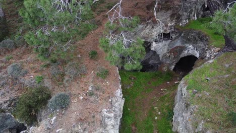 close aerial view of the entrance of an old magnesium mine