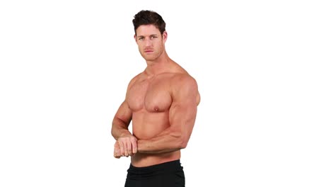 Muscular-man-flexing-his-muscles-