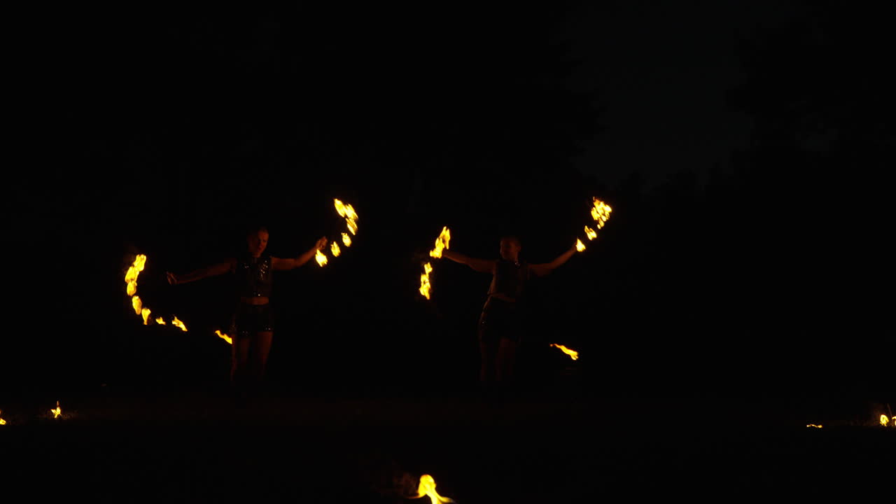 Fire Dancers at Night