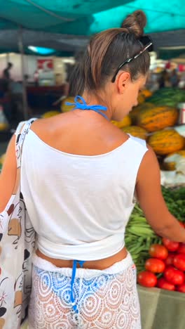 woman shopping at a summer market