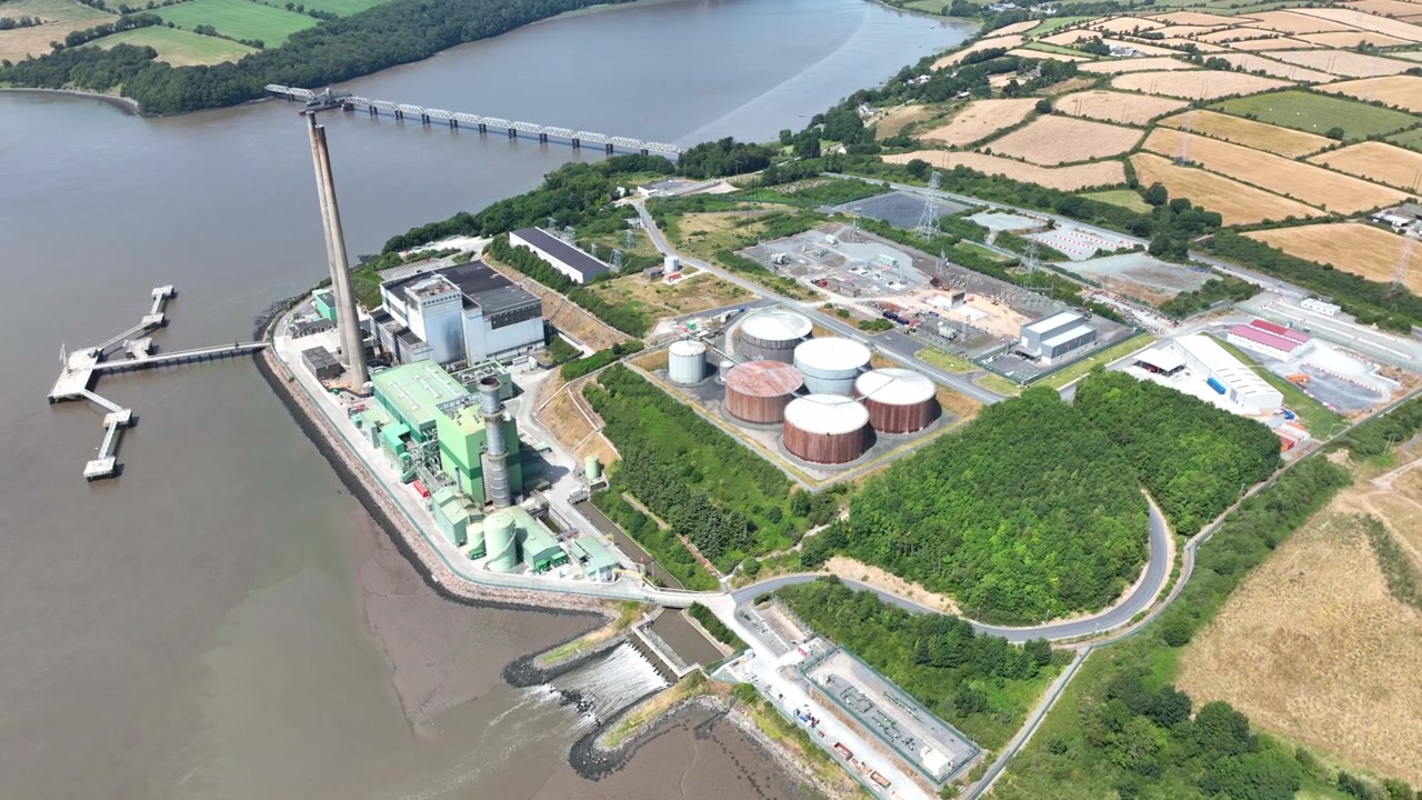 Drone panorama of electricity generation plant on the River Suir, Wexford, Ireland. power production with sweeping views of water, woodland and surrounding farmland.epic locations Ireland