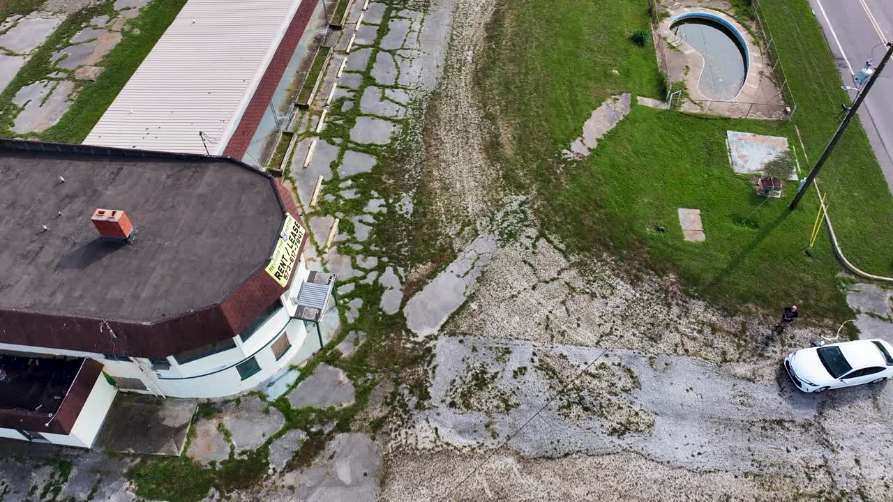 Aerial view of old and decaying Delta Motel with pool on Route 66 in Sullivan, Missouri
