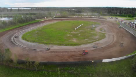 4k drone video of sprint car racing at mitchell raceway in fairbanks, ak during sunny summer evening-14