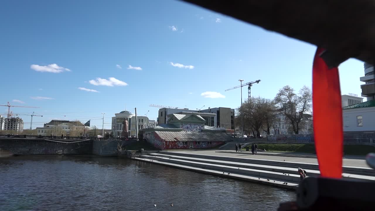 Love Locks on a Bridge Over a River in a City