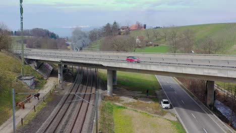 pacific br01 01 202 steam locomotive train traveling cross country in switzerland