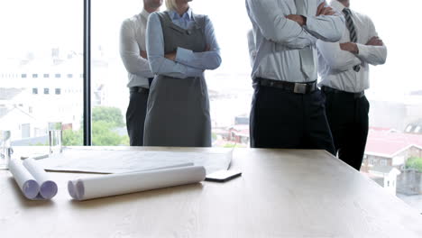 Standing-business-people-with-arms-crossed