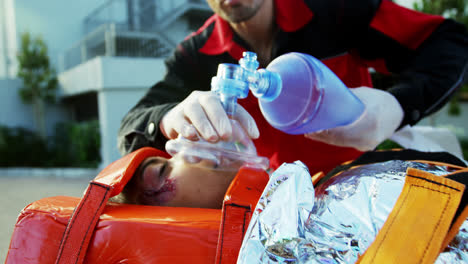 paramedics examining injured girl