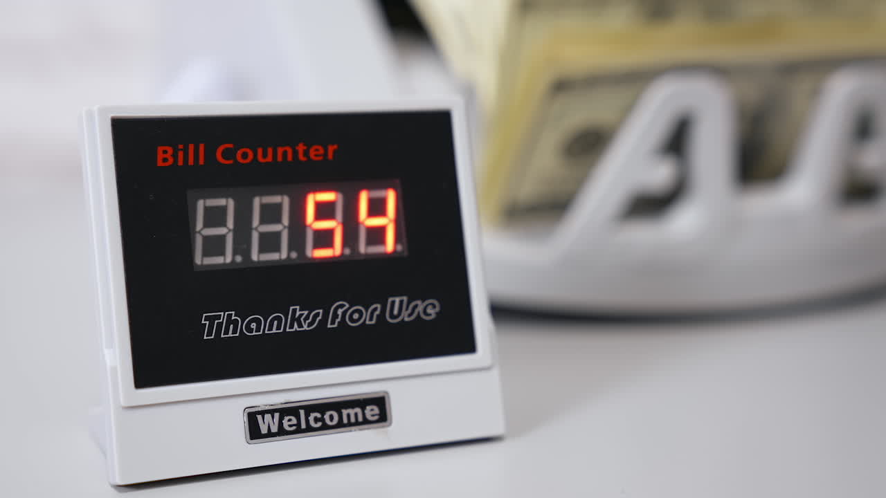 Electronic bill counter. Money counting equipment for paper money calculation. Automatic mechanism for bank financial operations. Currency exchange.