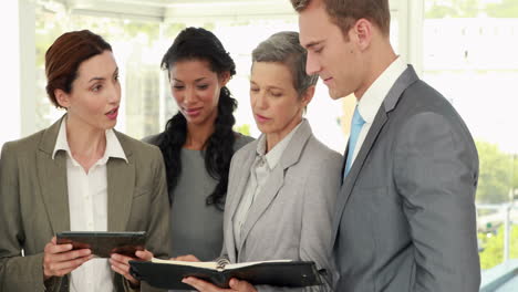 business people with tablet and notebook