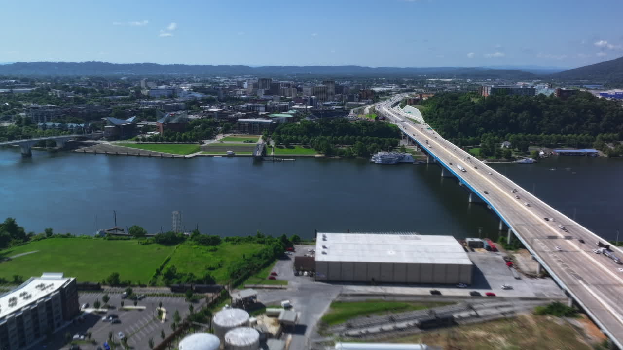 Aerial timelapse view of a busy highway stretching across the Tennessee River toward downtown Chattanooga, Tennessee