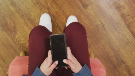 caucasian woman using her phone