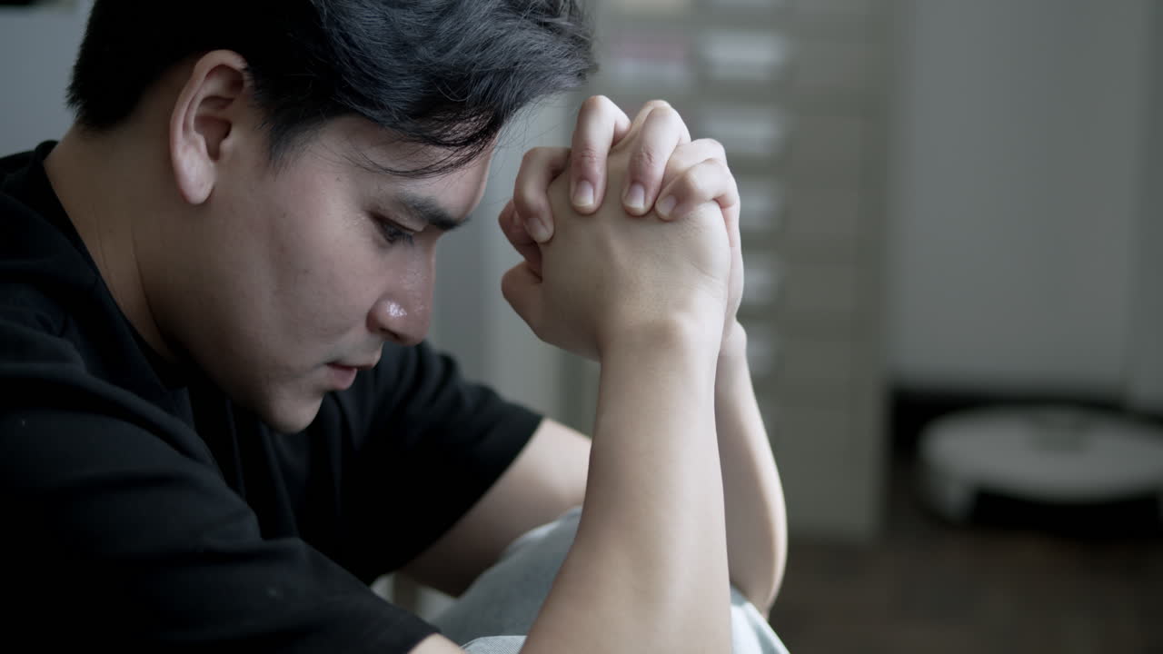 A young man in deep thought reflecting life challenges showcasing the power of introspection.