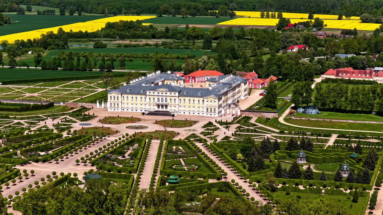 Stunning aerial of palace and surrounding land with radial patterns and historic design