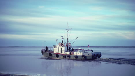 tugboat on a frozen river