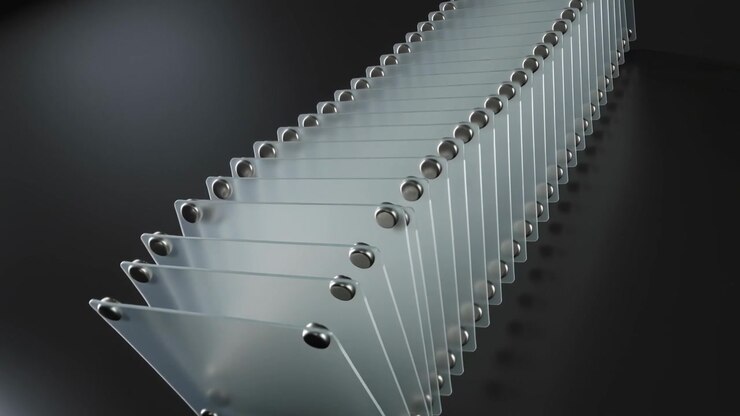 Tilting front plate starting frosted plate chain flipping along studio table, with metal pivots