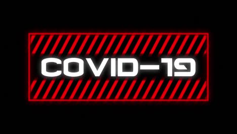 animation of the word covid-19 written in red frame on black background.