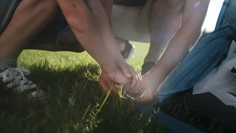 Close-up-video-of-father-and-son-at-the-tent-camping