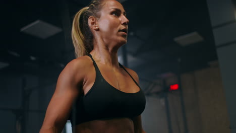 slow motion: skipping woman training at the gym. young woman skipping rope. athlete female jumping on skipping rope at cardio training in gym club.