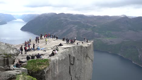 preikestolen  view with people on the rock