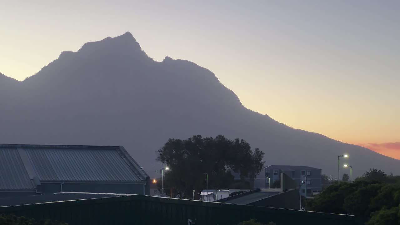 Mountain and Buildings at Dusk