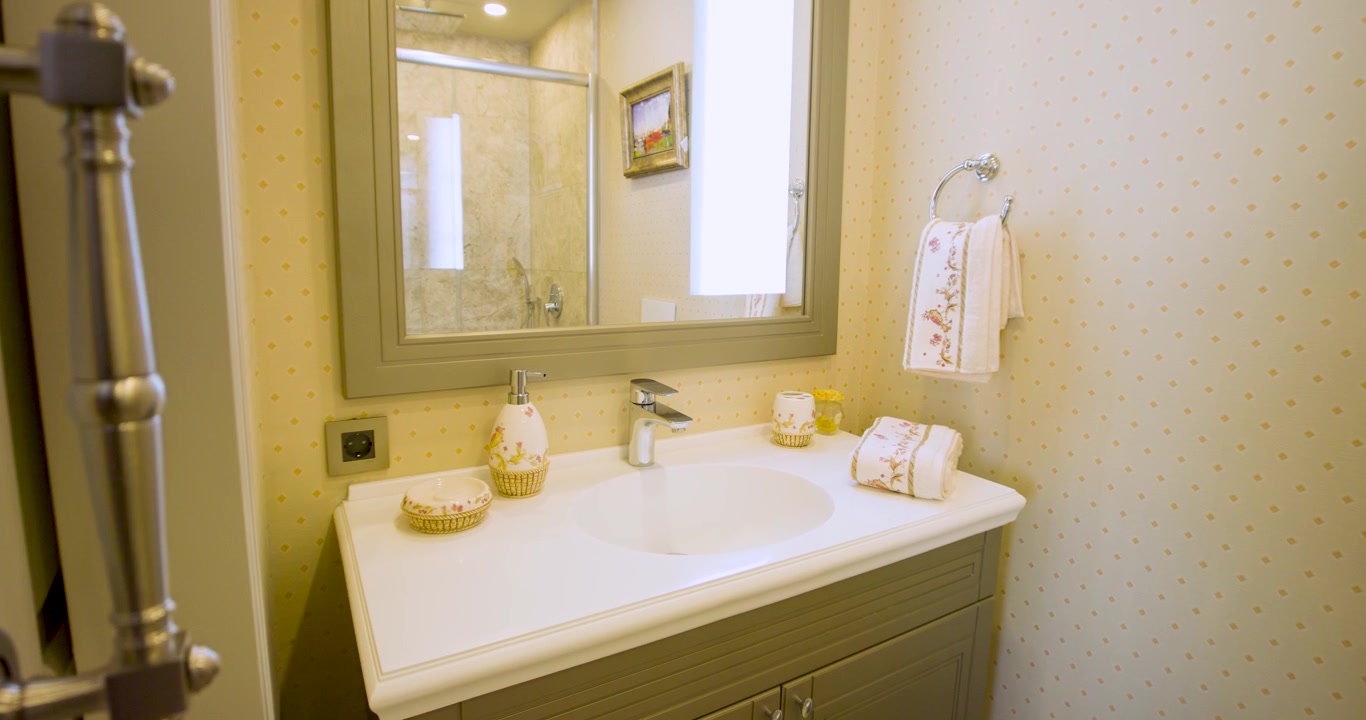 Slide into Elegant En Suite Bathroom from Bedroom on Bright Day
