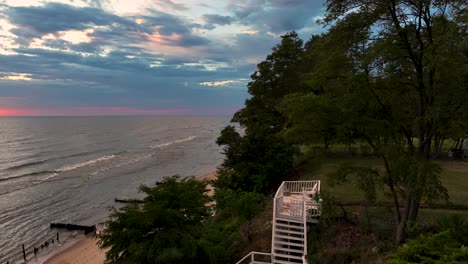 Rightward-truck-showing-high-homes-on-a-beach-bluff