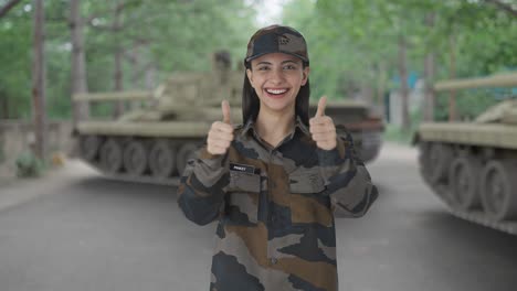 happy indian woman army officer showing thumbs up