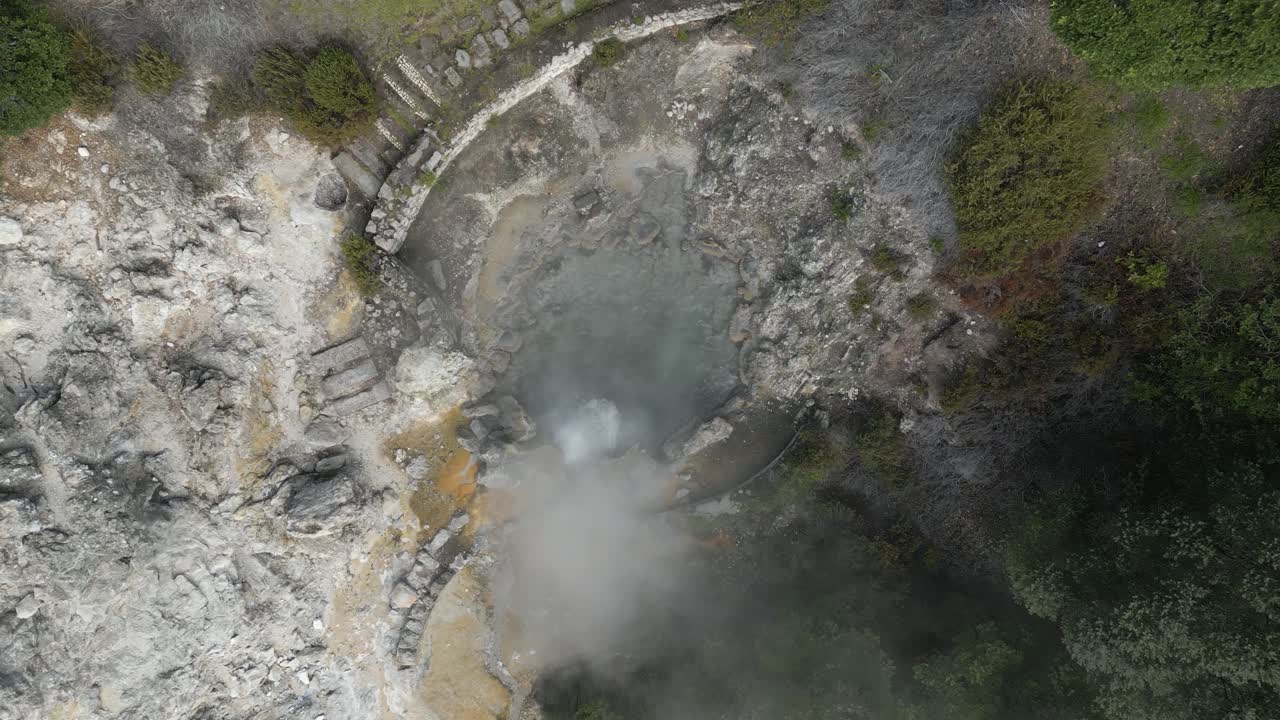 Boiling mineral hot springs at Furnas, Sao Miguel, Azores. Aerial top-down