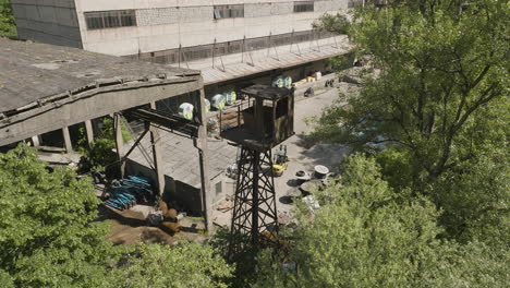 Rusty-watchtower-in-abandoned-industrial-warehouse-of-Chiatura-factory