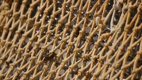 Close-up-of-a-fishing-net-in-slowmotion