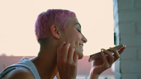 Pink-hair-woman-talking-on-mobile-phone-4k