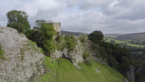 drone shot rising above peveril castle 01