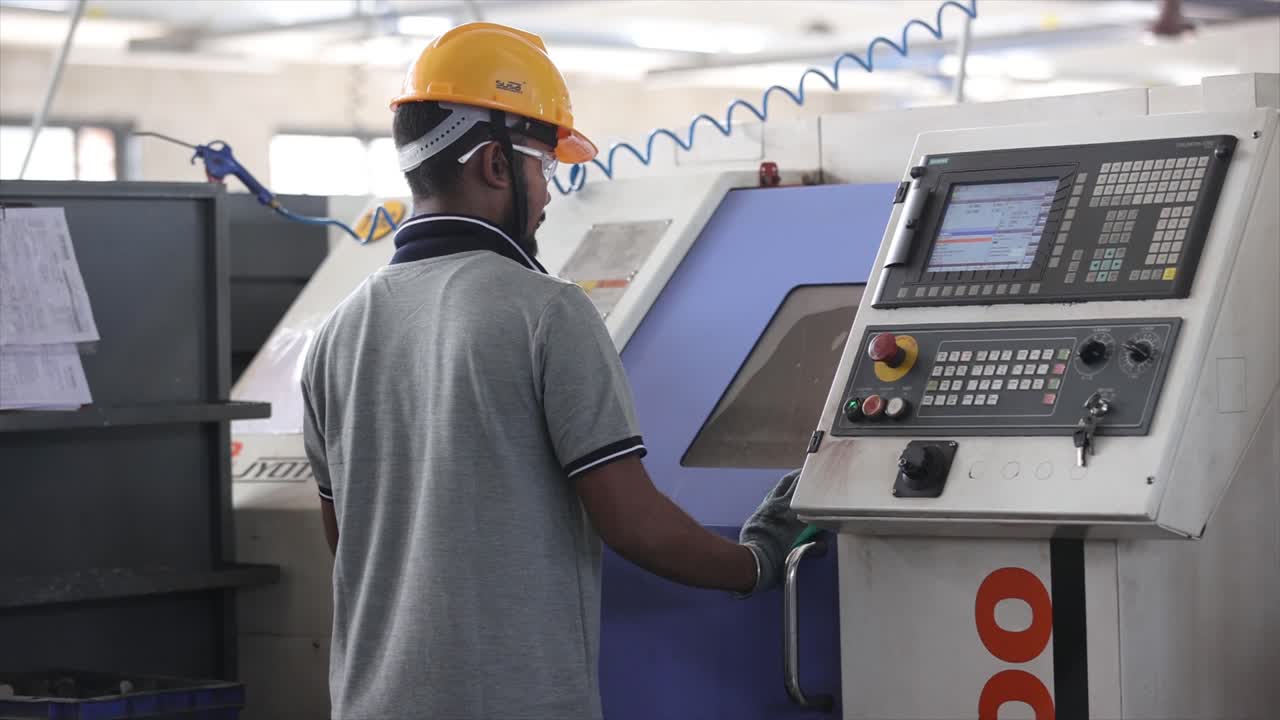 engineer worker in uniform working at industrial factory.
