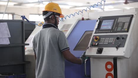 engineer worker in uniform working at industrial factory.