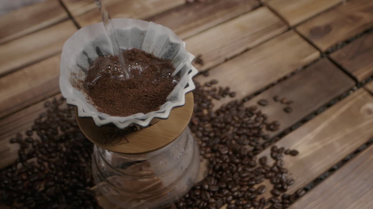 Mixing water directly with coffee grounds is an old-fashioned method, celebrating simplicity and tradition for a pure, authentic brew experience.