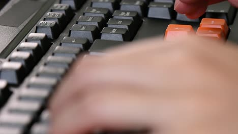 Extreme-close-up-on-the-gaming-computer-keyboard-while-playing-a-computer-game