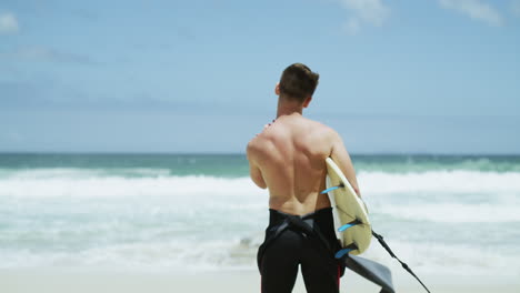 warming up his muscles for the waves