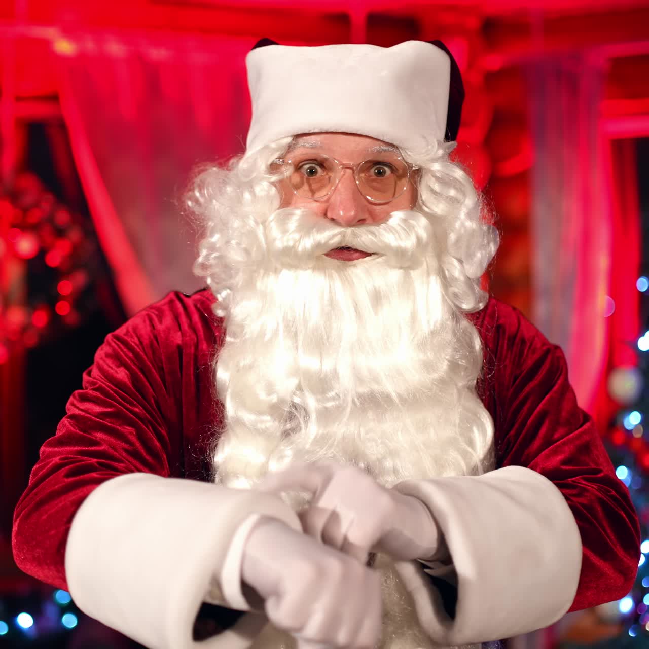 Portrait of bearded Santa Claus. Santa clause standing in specially decorated room
