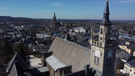 aerial view of a european town with church and clock tower