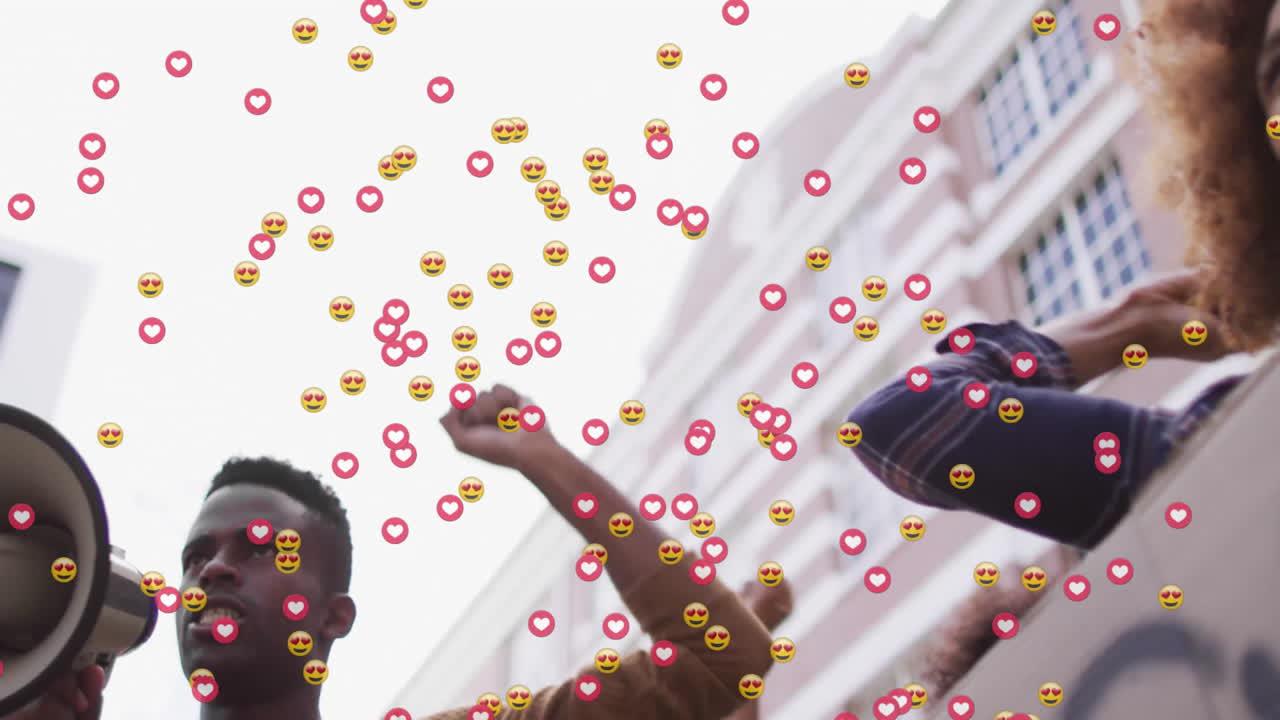 Animation of media icons over biracial people with signs protesting