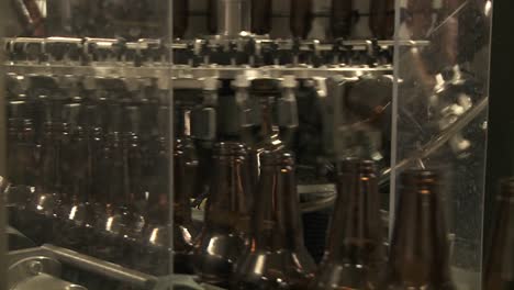 bottles zip along a conveyor belt in a bottling plant 7